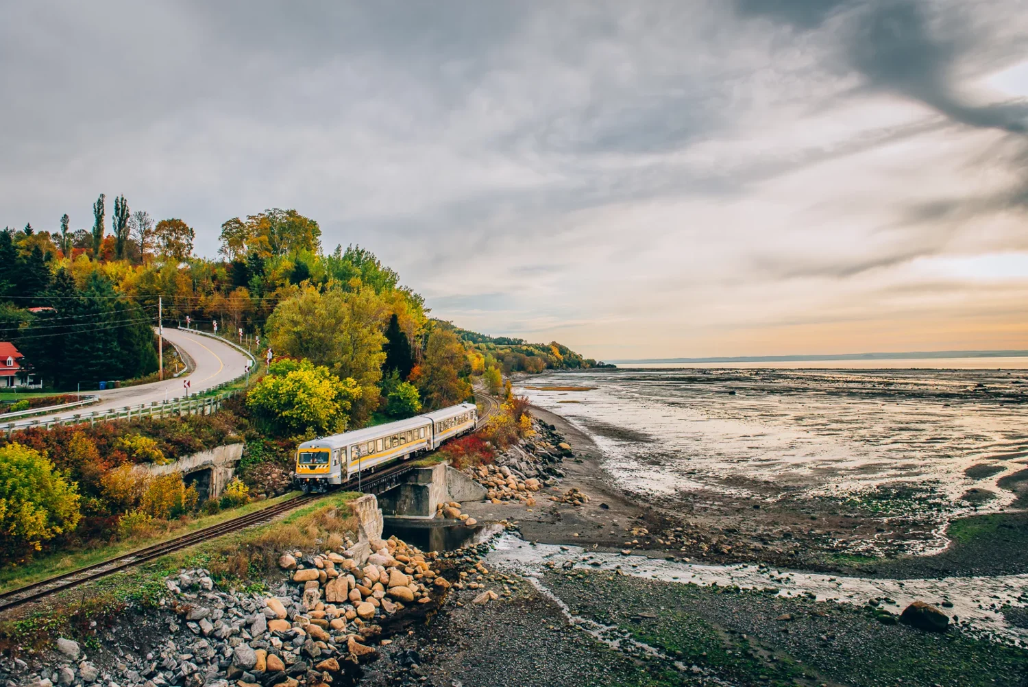 The Train de Charlevoix running along the Saint Lawrence amid autumn colours