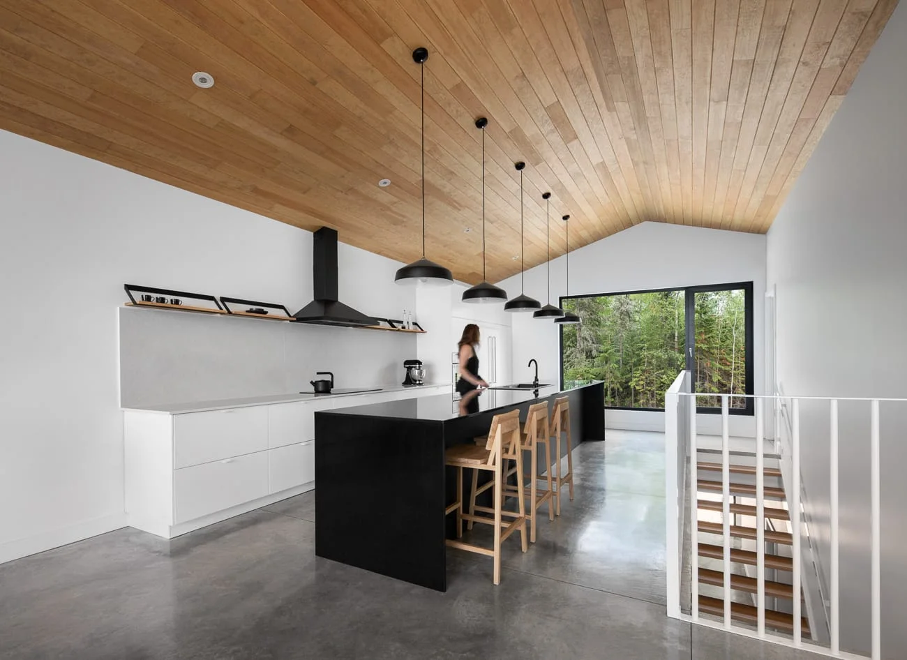 Gourmet kitchen at Le Littoral chalet with island and large windows
