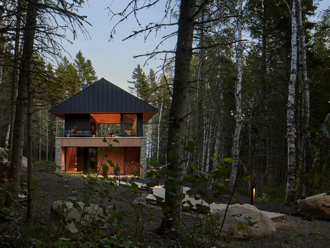 Villa Luce in the evening, lit facade, Charlevoix